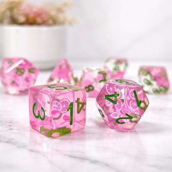 Pink Citrus dice set, translucent pink with citrus fruit patterns