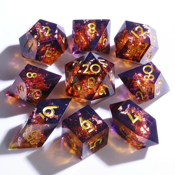 Molten Ember dice set, amber-orange resin with gold flakes